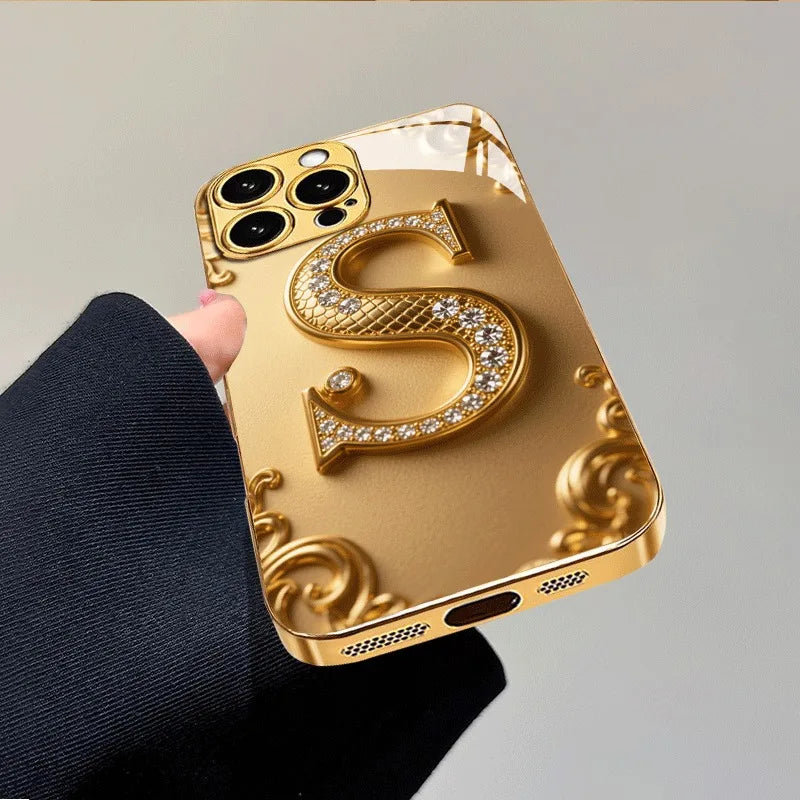 Luxury Golden “S” Pattern Metallic Glass iPhone Case – Shockproof Hard Cover for iPhone 17/16/15/14/13/12 Pro Max Plus