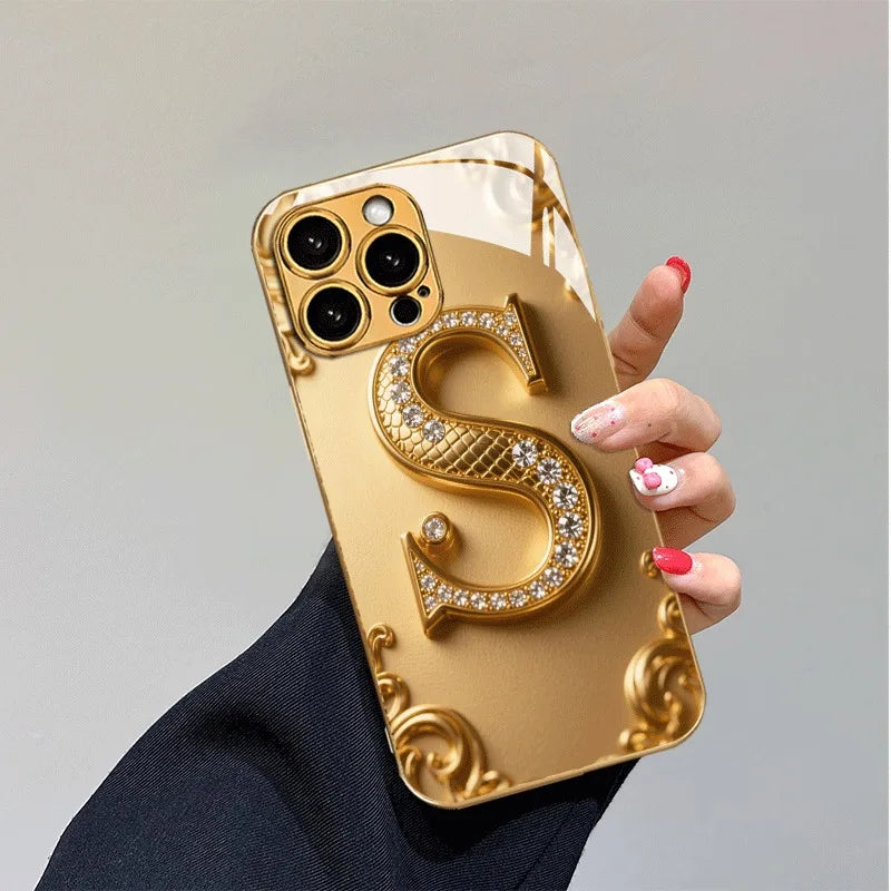 Luxury Golden “S” Pattern Metallic Glass iPhone Case – Shockproof Hard Cover for iPhone 17/16/15/14/13/12 Pro Max Plus